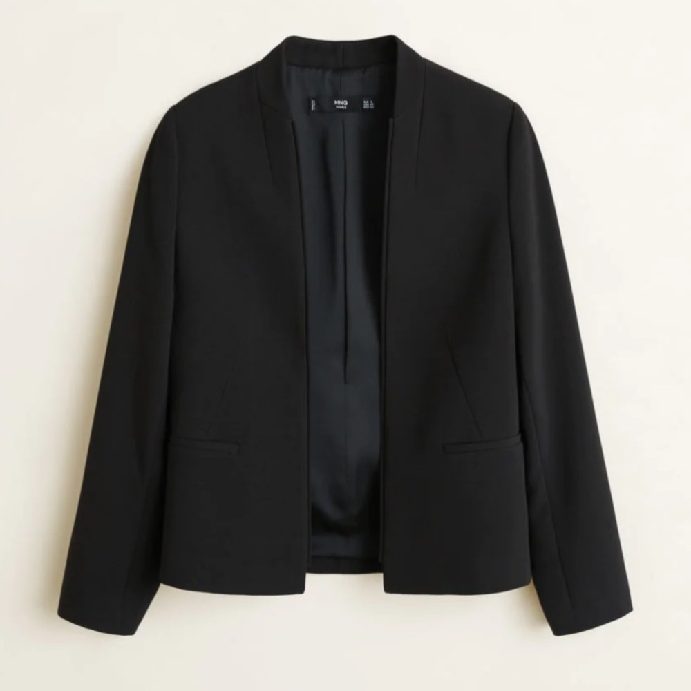 Two Pocket Blazer with Inverted lapels . Super cute and modern blazer.